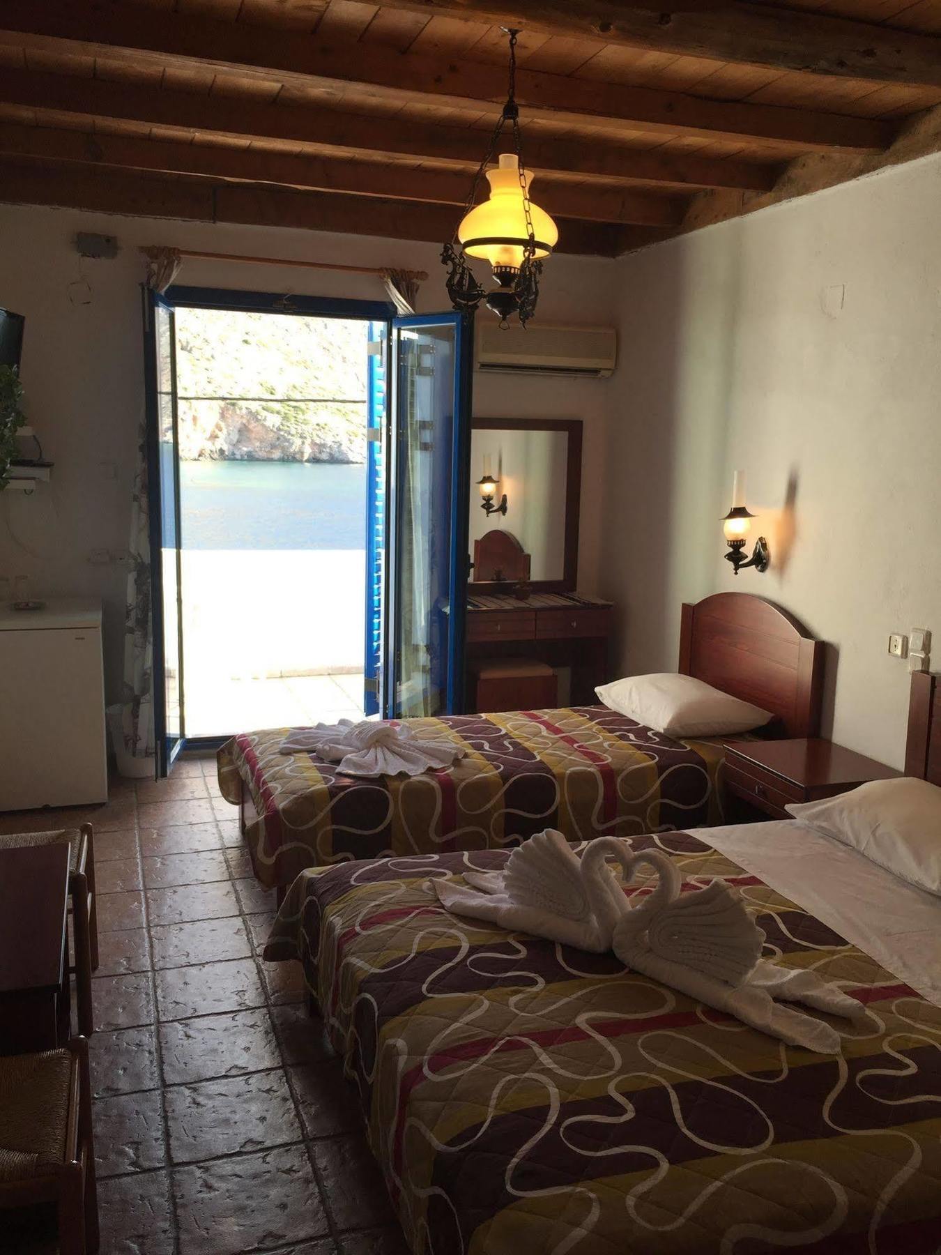 Daskalogiannis Hotel Loutro Bagian luar foto