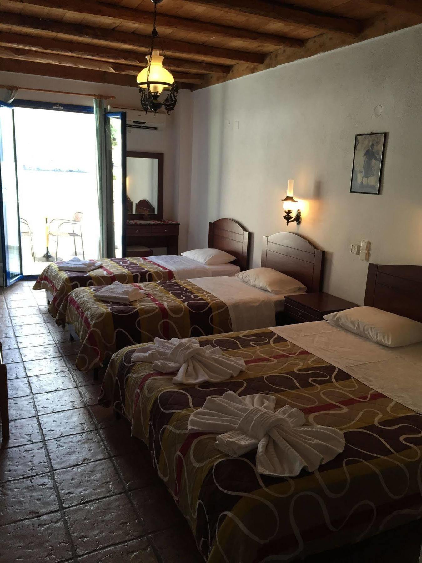 Daskalogiannis Hotel Loutro Bagian luar foto